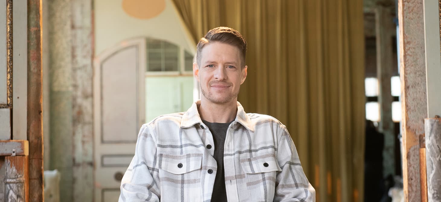 Zach is looking straight ahead.