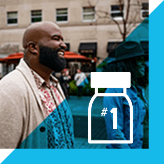 Phil looking ahead and smiling.