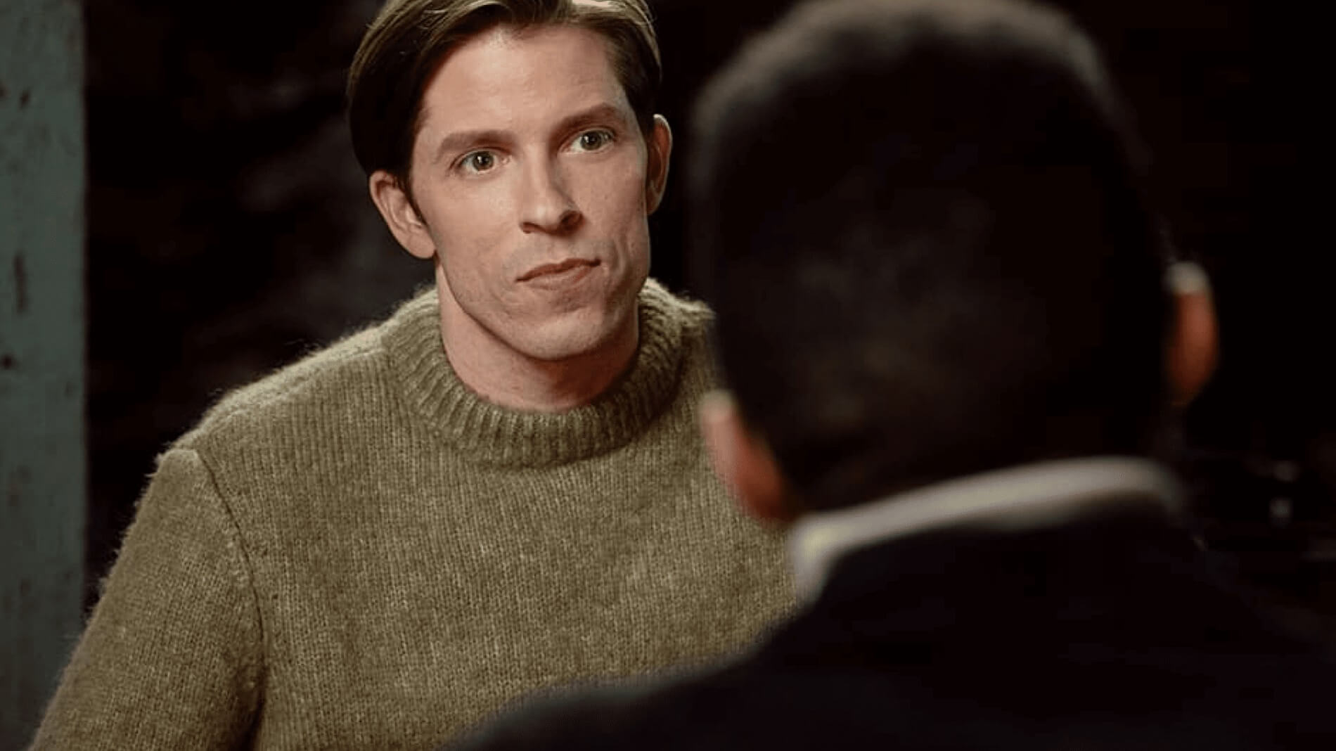 Chad and Dimitri video play button.