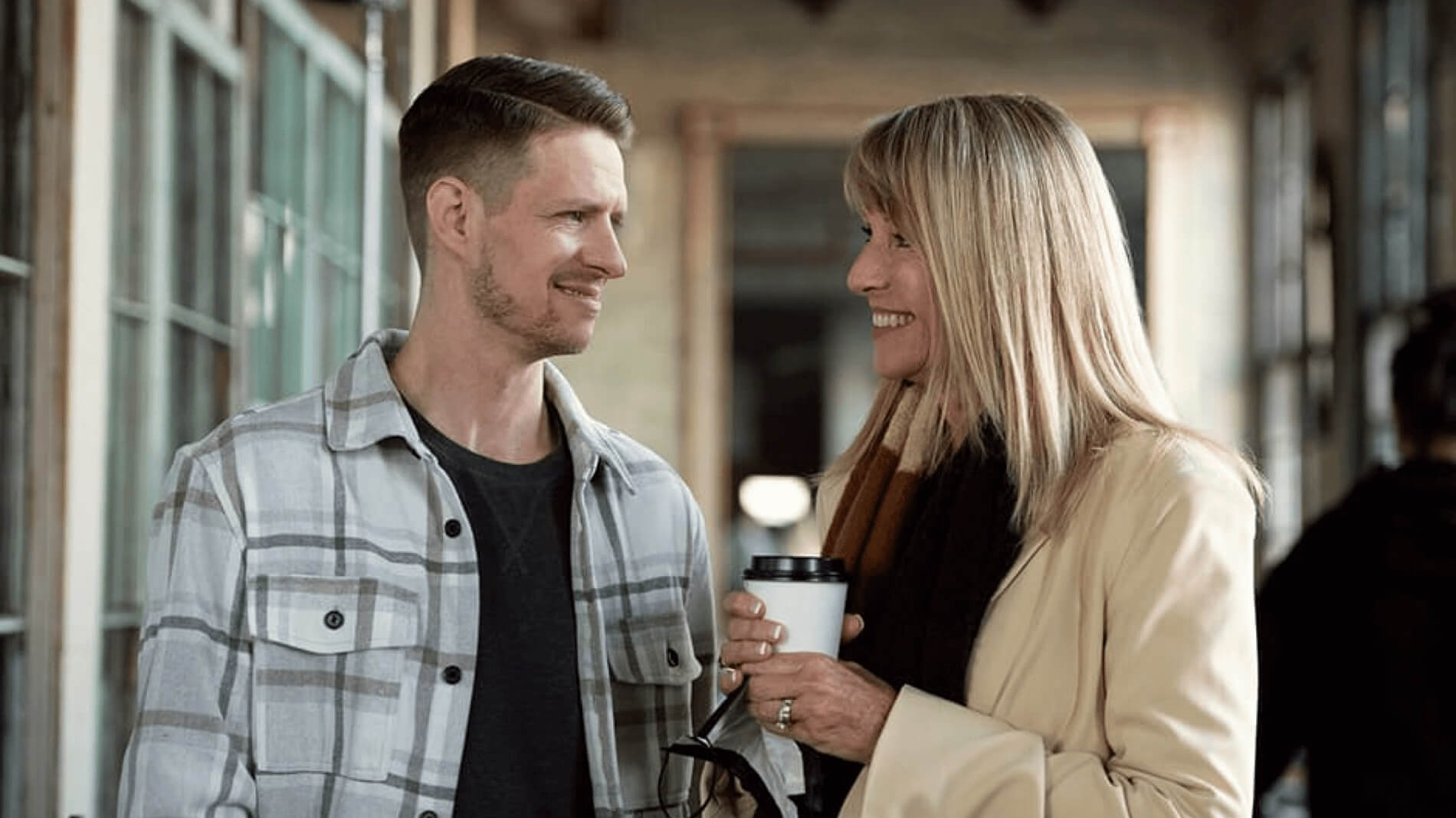 Zach and Stina video play button.